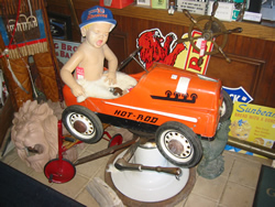 Antique toy car and doll